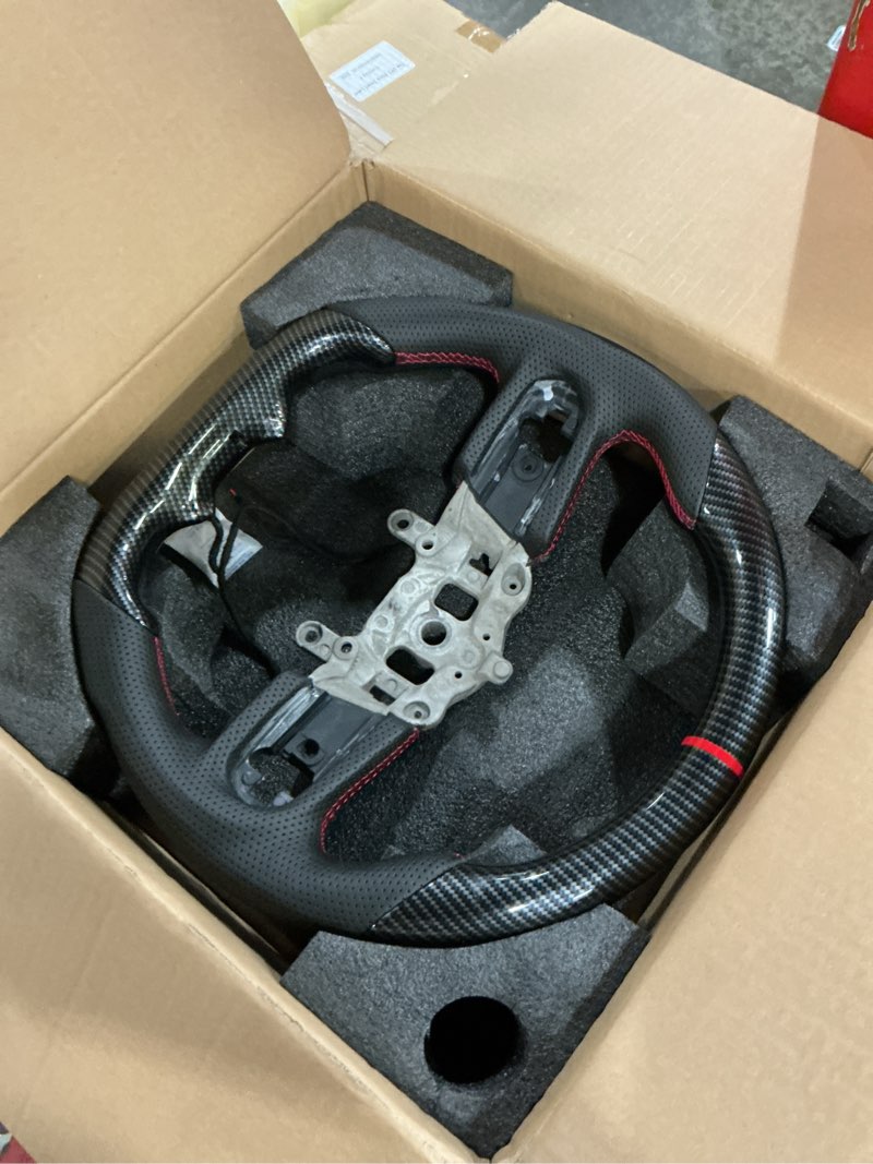 Condition photo showing As Is for real carbon fiber steering wheel for jeep wrangler jl/jlu/jt 2018-2023, d-shaped flat-bottom perforated leather grip (with heating) for wrangler 2018-2023 with heating