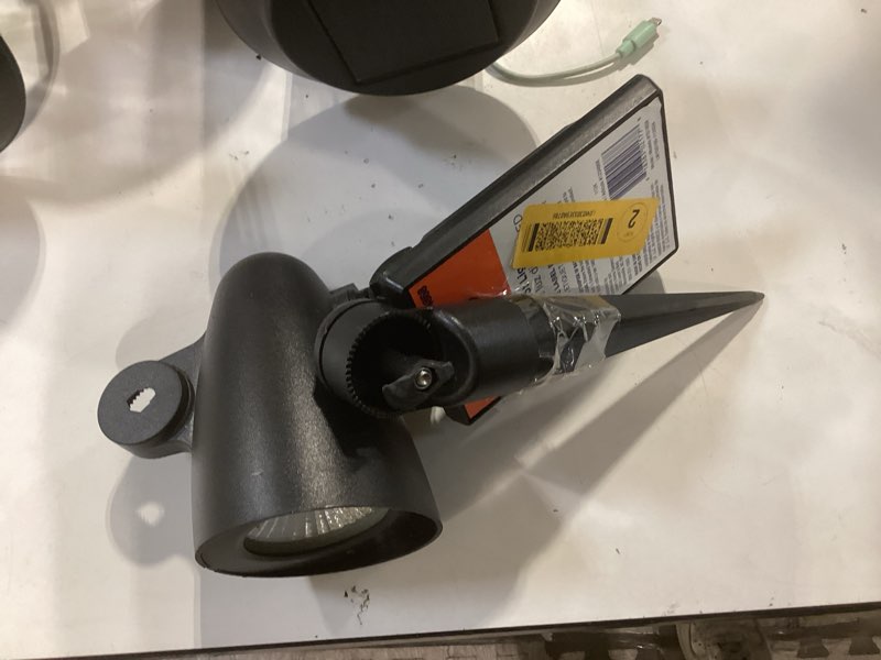 Condition photo showing As Is for harbor breeze 60 -lumens 1 -watt black solar led spot light