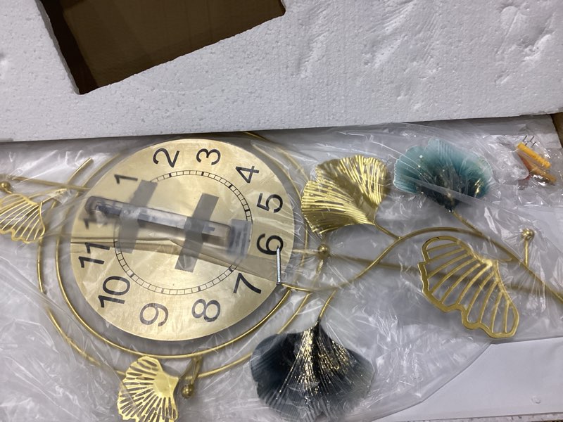 Condition photo showing New/Like New for Wall Clock, Large Gold Wall Clock for Living Room Decor?Unique Office Clocks Battery Operated?Oversized Modern Wall Art for Bedroom,Farmhouse,Office Wall Decor 17.7 X 28.3 Inches 17.7"x 28.3" Gold Ginkgo Leaf