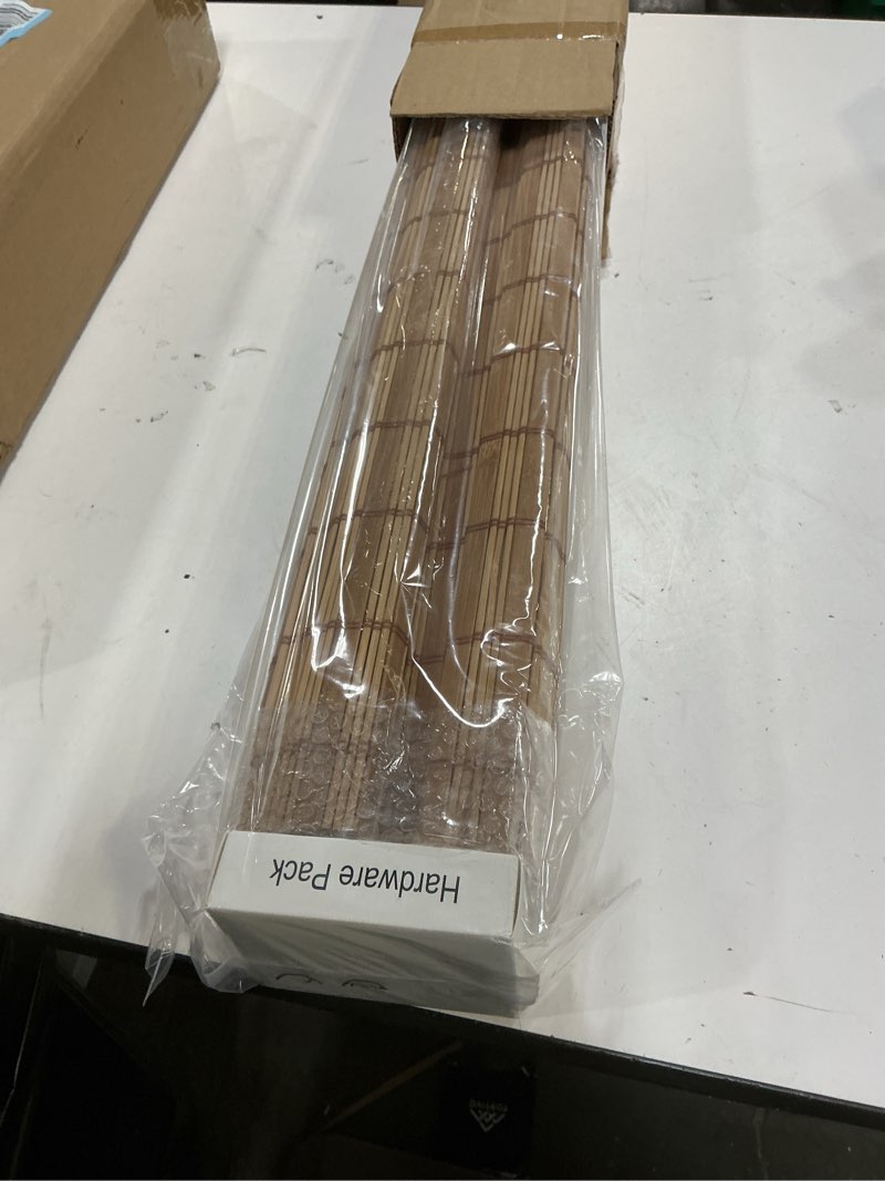 Condition photo showing New/Like New for bamboo roman shades with valance cover, cordless blinds for indoor windows, light filtering woven wood shades for home & patio, privacy protection, 25" w x 64" h, carbonized light filtering-carbonized 25"w x 64"h