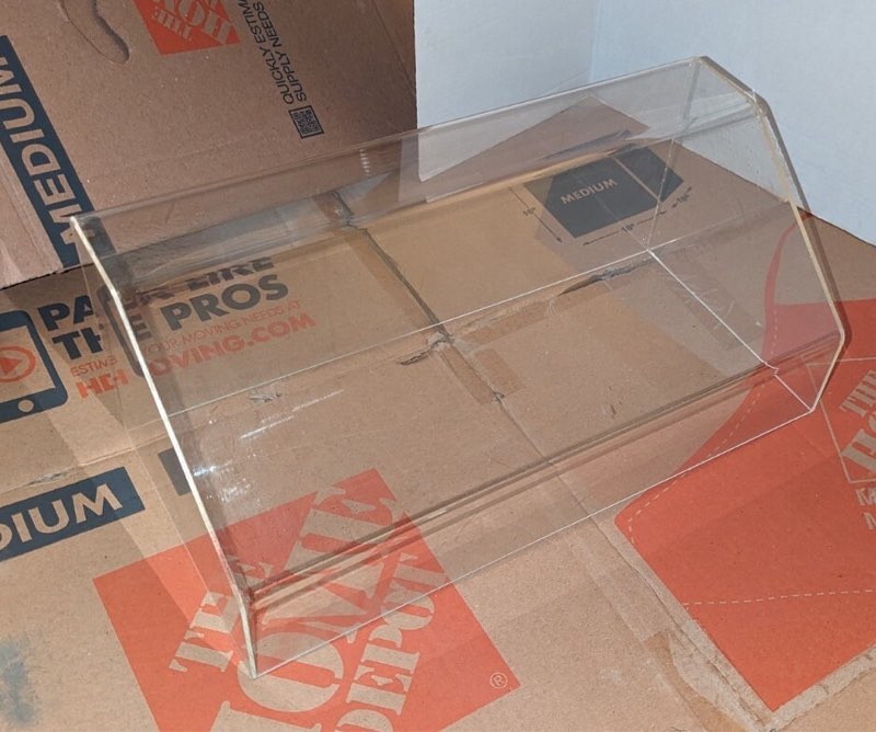 clear acrylic display case or storage bin