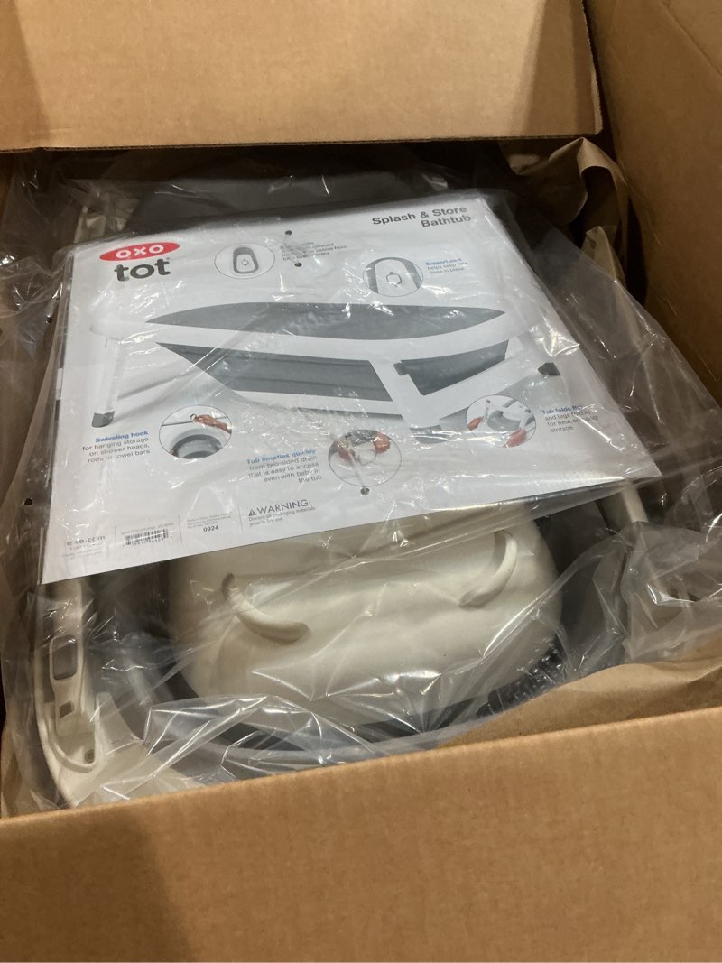 Condition photo showing New/Like New for oxo tot splash & store bathtub | baby bathtub | newborn baby essentials | for keeping bathtime secure & tidy | 0-18 months | tub folds flat for compact storage