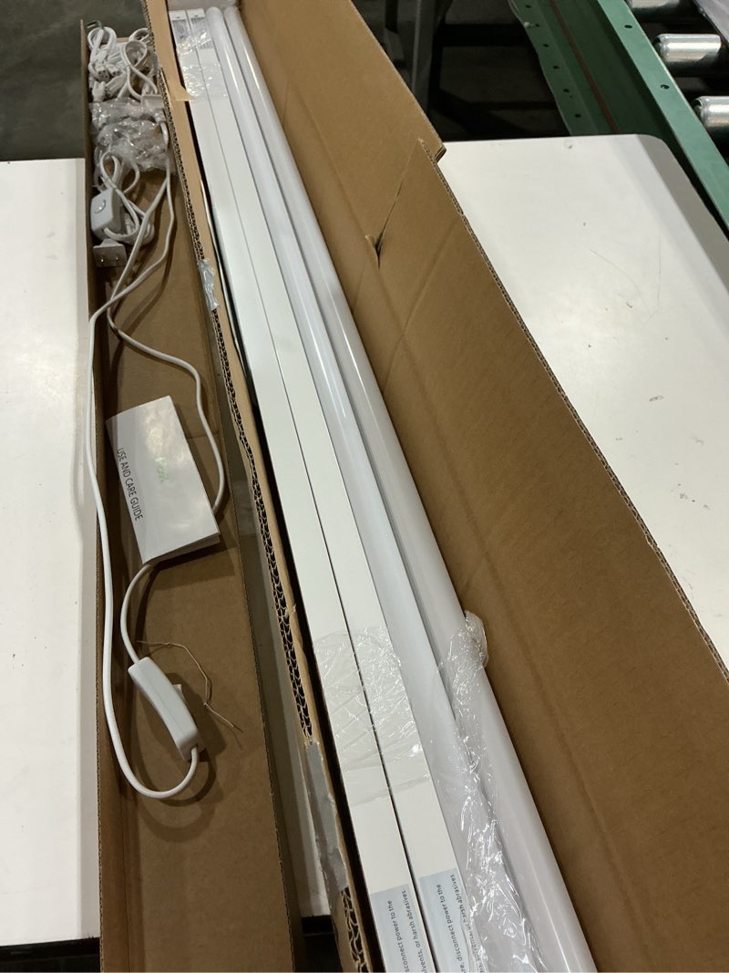Condition photo showing Good Condition for pak 4ft led shop lights, 2300lm 6500k cool white, 20w energy efficient linkable ceiling and under cabinet lighting, t5 integrated utility fixture for garage, workshop, basement, fcc certified, 4 pack white 4ft 6500k-4 pack