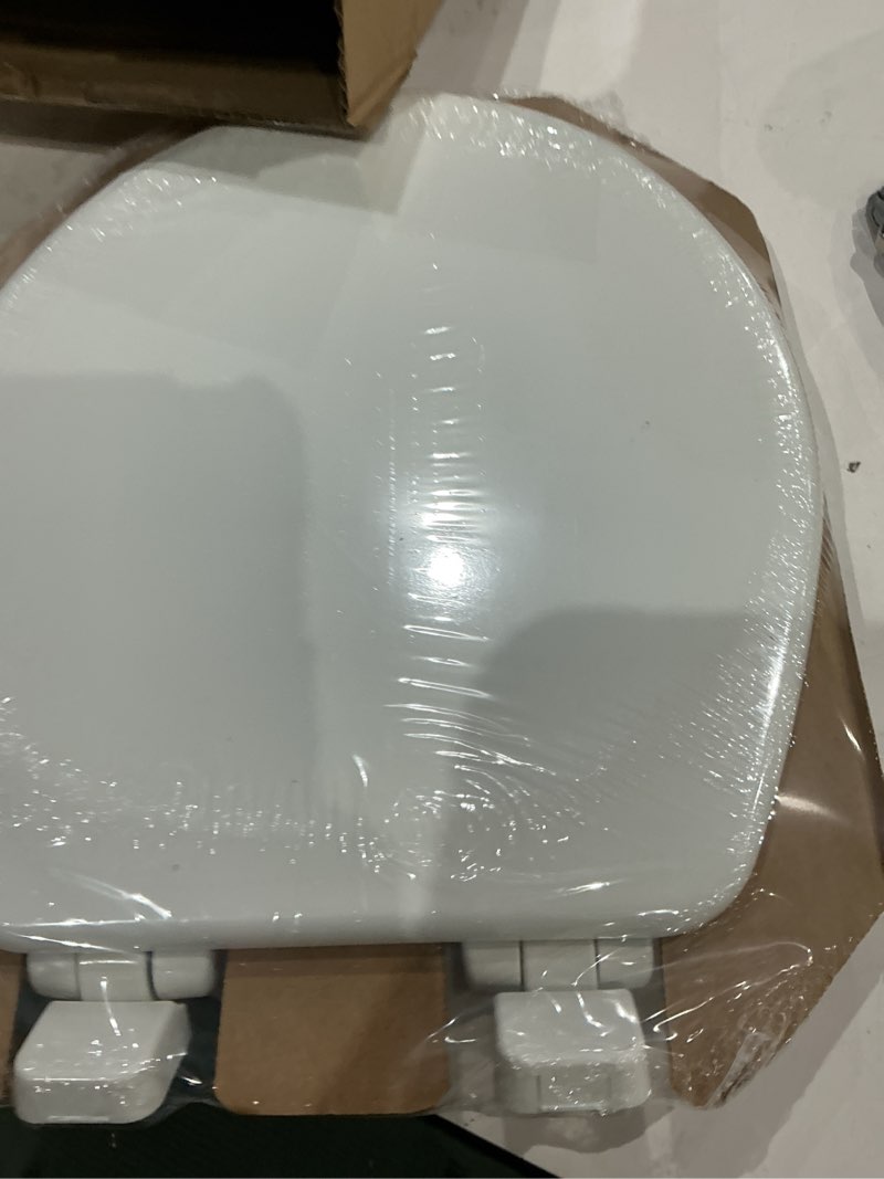 Condition photo showing Good Condition for mayfair linden slow close toilet seat, non slip heavy duty wood, easy install, round, white round traditional hinge