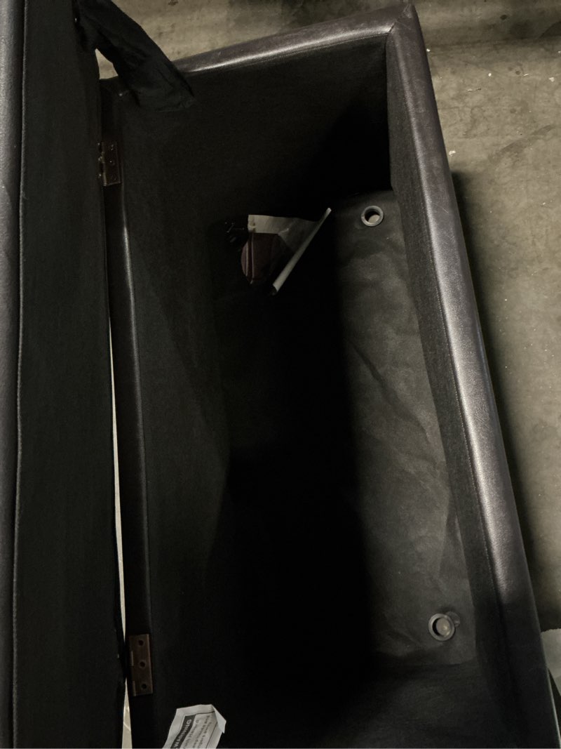 Condition photo showing Good Condition for better homes & gardens 30" hinged storage ottoman, black faux leather