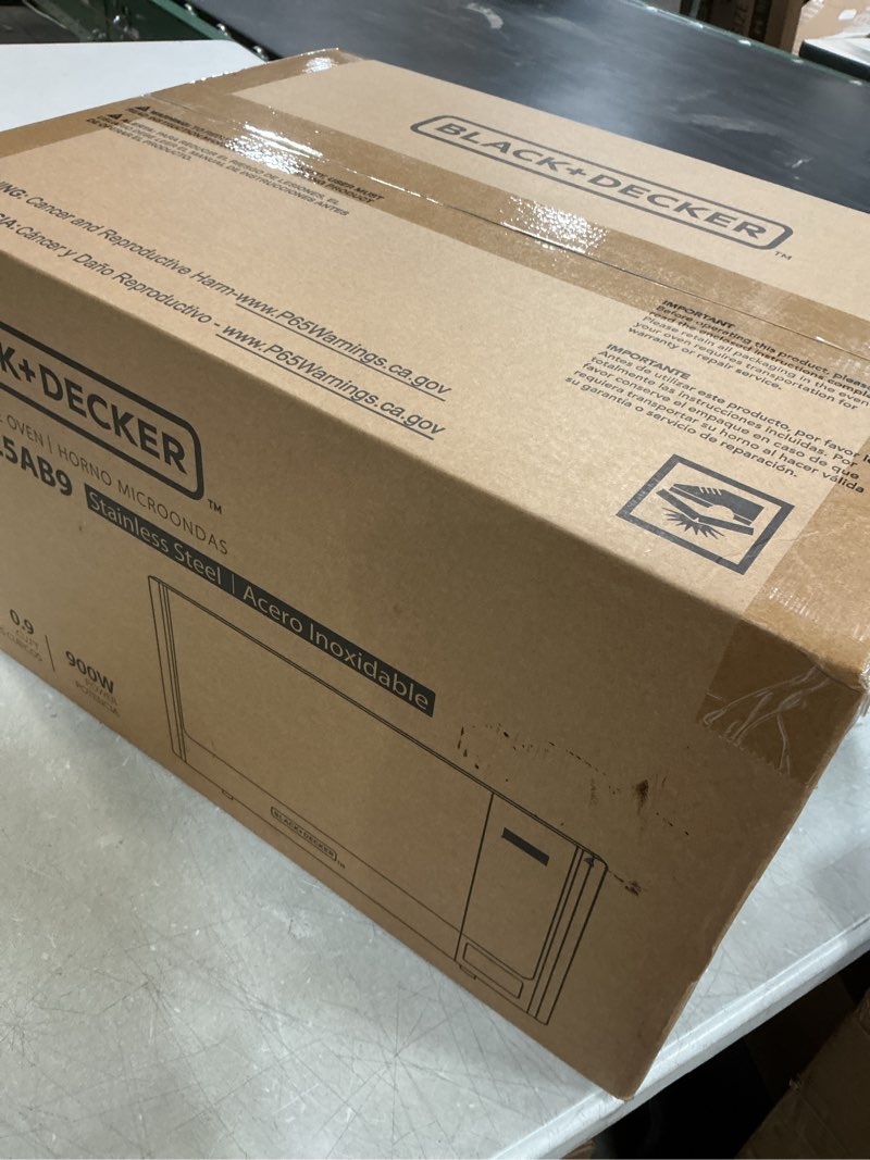 Condition photo showing New/Like New for BLACK+DECKER Digital Microwave Oven with Turntable Push-Button Door, Child Safety Lock, Stainless Steel, 0.9 Cu Ft 0.9 Cu.Ft