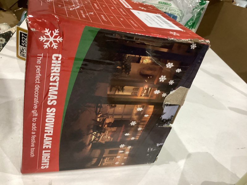 Condition photo showing Good Condition for Christmas Snowflake Lights Outdoor, 16.73ft Outdoor Led Icicle Christmas Lights with 20 Drops, Waterproof Icicle String Light for Eaves, Window, Curtain Xmas Decorate Multicolor 16.73ft