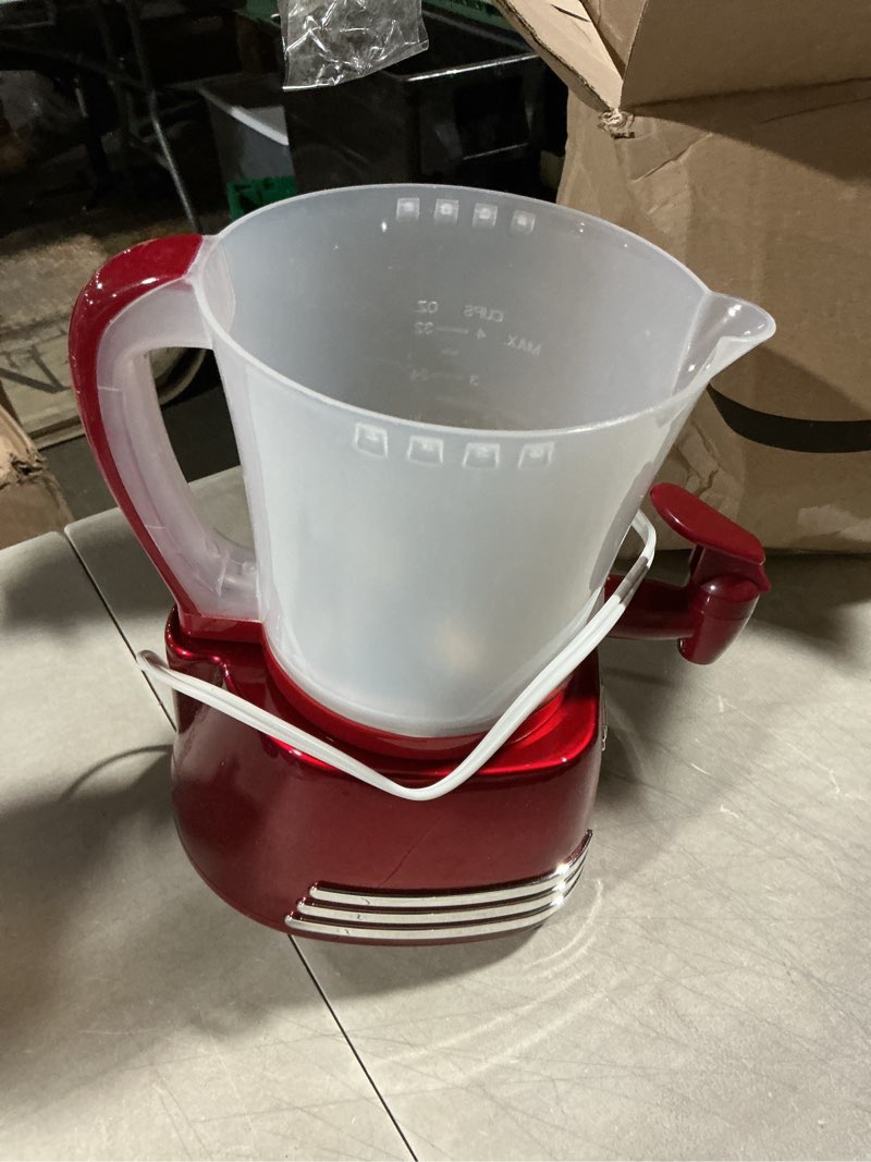 Condition photo showing As Is for retro red nostalgia hcm700 32-oz. tested hot chocolate maker and dispenser