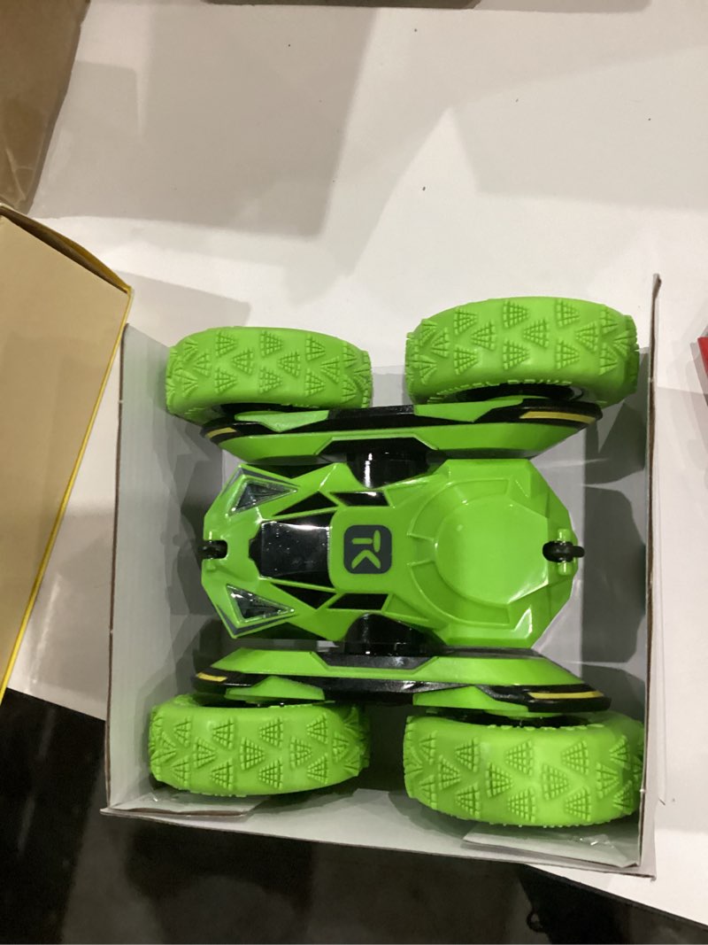 Condition photo showing New/Like New for SIMILAR TO COLOR IS GREEN Threeking Remote Control Car RC Cars Toys for Boys Girls Ages 6-12, Upgraded USB-C Modular Batteries, 4WD Stunt Car with Breathing Soft Lights, Double-Sided Driving & 360° Flips, Presents Gifts, 