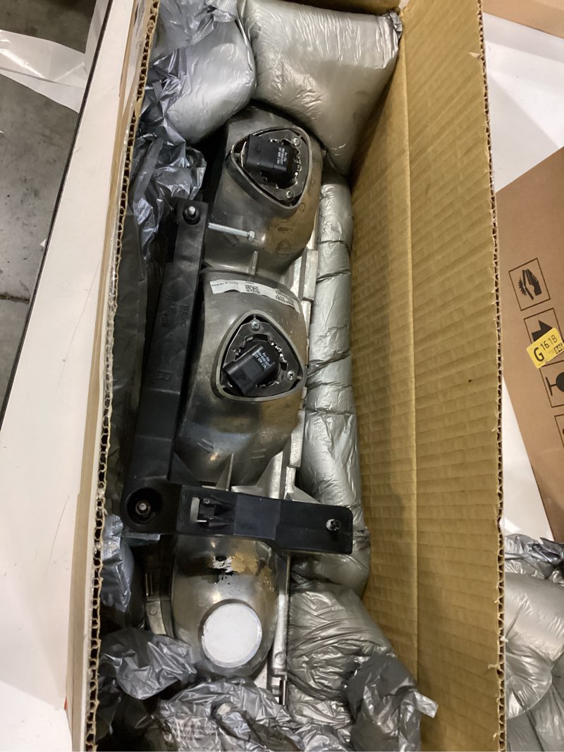 Condition photo showing As Is for Dorman 1590073 Passenger Side Headlight Assembly Compatible with Select Saturn Models