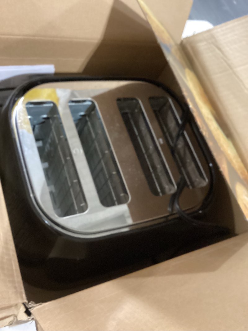 Condition photo showing Good Condition for black+decker 4-slice toaster, extra wide slots, 7 shade settings, 1400 watts, frozen and bagel buttons, toast shade selector, extra lift 4-slice black