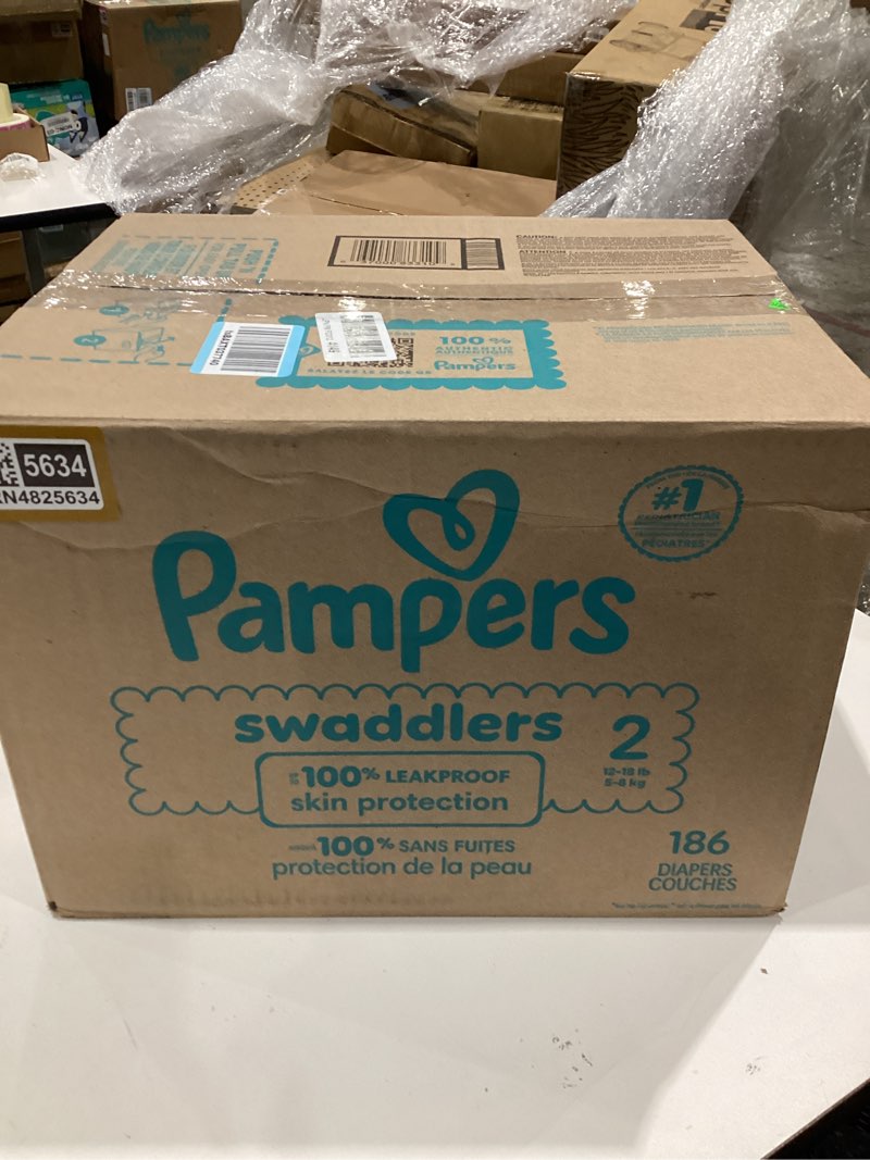 Condition photo showing New/Like New for huggies size 2 diapers, little snugglers baby diapers, size 2 (12-18 lbs), 186 count (3 packs of 62), packaging may vary
