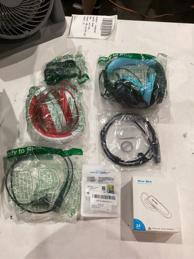 assorted lot of electronics (headphones, small gadgets, headsets, etc.) 