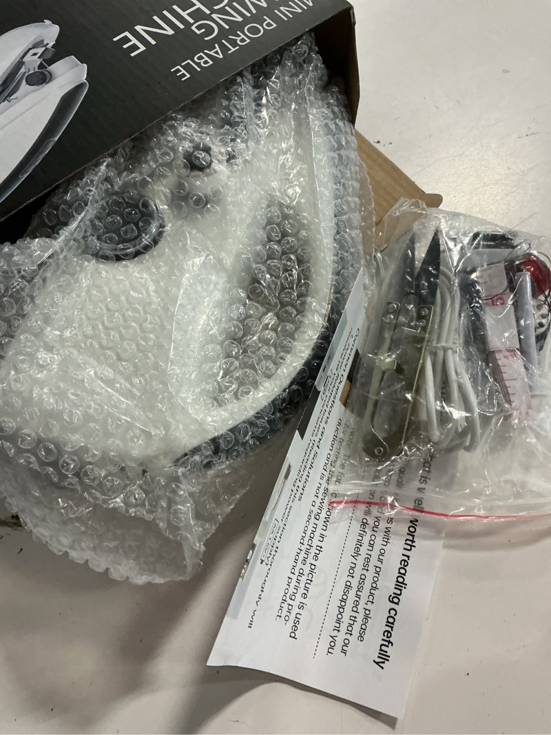 Condition photo showing Good Condition for handheld sewing machine,easy to use, electric sewing machine?fast sewing speed, easy sewing of clothes and fabrics, suitable for beginners diy white