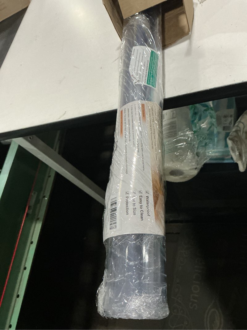 Condition photo showing Good Condition for LovePads Clear Table Cover Protector 36 x 60 Inch, 1.5mm Thick Plastic Table Cover, Table Protector for Dining Room Table, Waterproof Vinyl Tablecloth Table Pad Mat for Kitchen, Dresser, Writing Desk 36" x 60" (Rectangular) Clear 1.5mm