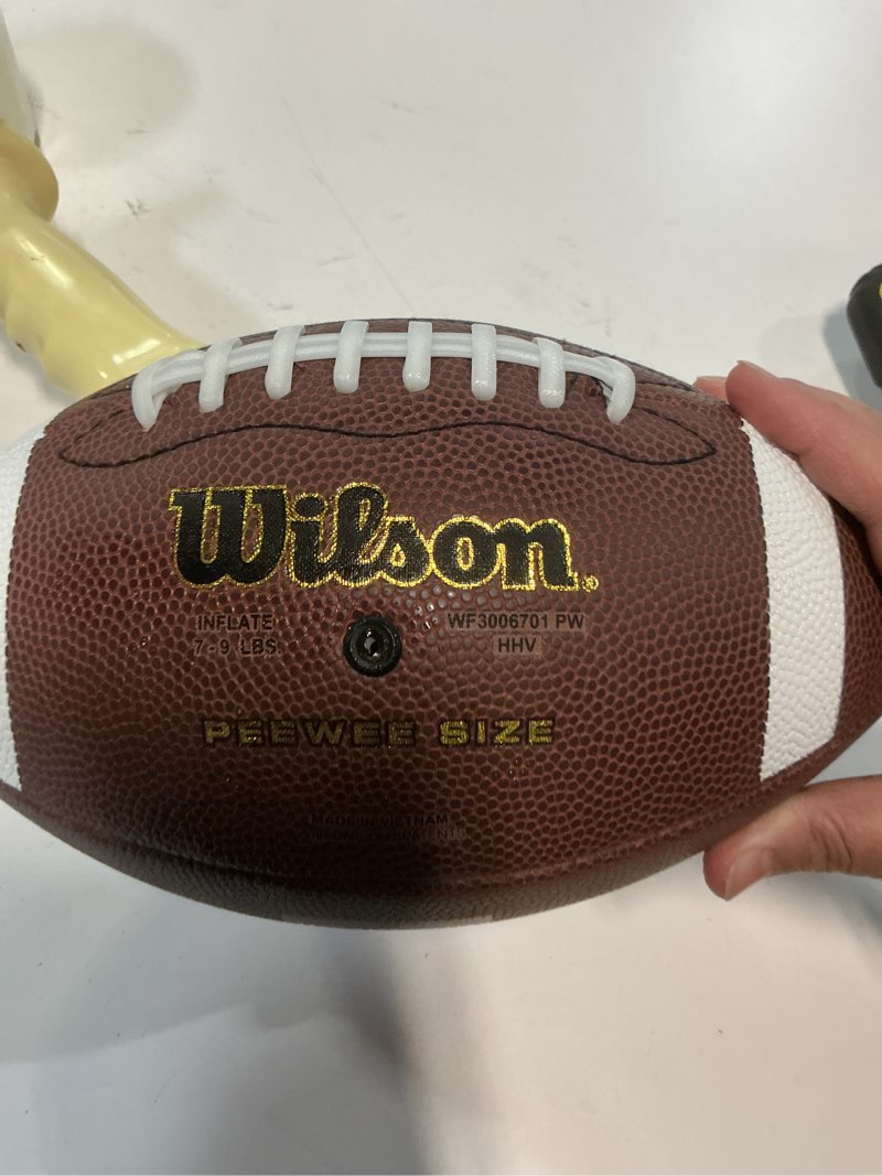 Condition photo showing As Is for wilson ncaa rubber bladder red zone composite football (ages 14 and up) ( similar ( 7 -9lbs