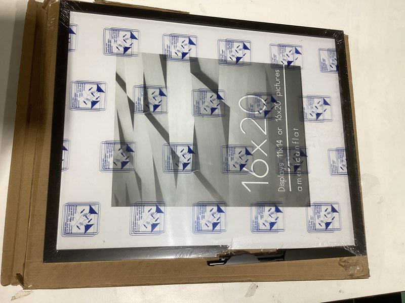 Condition photo showing As Is for Americanflat 16x20 Picture Frame with Polished Plexiglass - Use as 11x14 Frame with Mat or Display 16x20 Photo Without Mat - Streamline Collection - Thin Border Picture Frames for Wall - Black Black 16x20 1 Pack