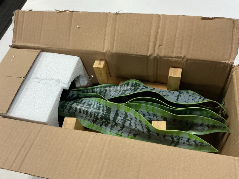 Condition photo showing Good Condition for hollyone artificial snake plant potted with solid wood plant stand, 19" faux sansevieria tropical white ceramic pots fake plants for home office indoor decor housewarming gift green-19" style 1