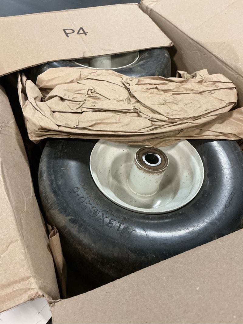 Condition photo showing As Is for 13x6.50-6 flat free lawn mower tires and wheels 3/4" 5/8" 1/2" ball bearings, 13x6.5x6 zero turn mower front tires, smooth tires for commercial grade lawn 5.5"-7.5" adjustable centered hub 13x6.50-6 - 2p ( flat free ) white