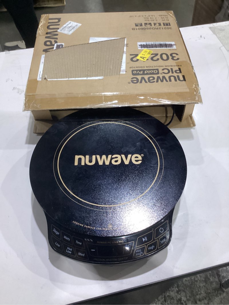 Condition photo showing As Is for not tested****nuwave precision induction cooktop gold, 12” shatter-proof ceramic glass surface, large 8” heating coil, portable, 51temp settings 100°f to 575°f, 3 wattage settings 600, 900, and 1500 watts