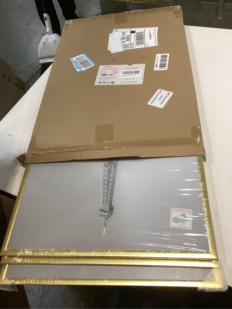 Condition photo showing New/Like New for upsimples 16x24 Picture Frame Gold 3 Pack, Scratch-Proof Poster Frames 16 x 24 for Photo Gallery - Slide-In Strips, Horizontal or Vertical Wall Mounting Gold 16x24