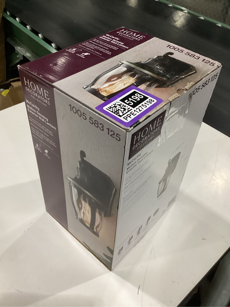 Condition photo showing New/Like New for 1-light bronze with gold highlights motion sensing outdoor wall mount lantern