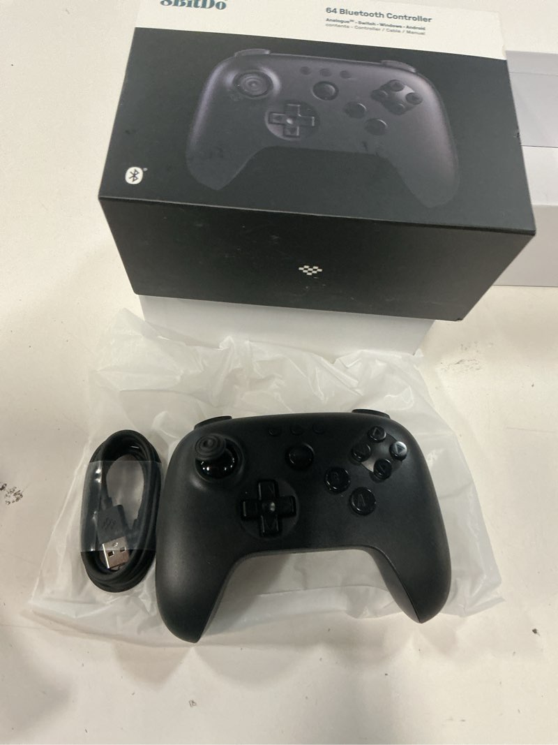 Condition photo showing New/Like New for 8bitdo 64 bluetooth controller for analogue 3d, switch, switch 2, windows, and android (black)