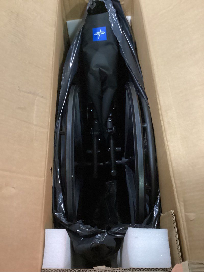 Condition photo showing New/Like New for medline lightweight wheelchair for adults with swing-back, desk-length arms, elevating leg rests; 18w" x 16"d seat 18" seat width