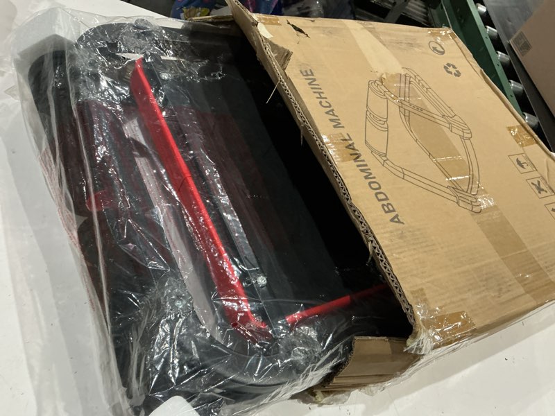 Condition photo showing As Is for abdominal device, reduce fat, increase muscle and shape, adjust strength freely, fold and store easily, quiet and not disturbing neighbors, black