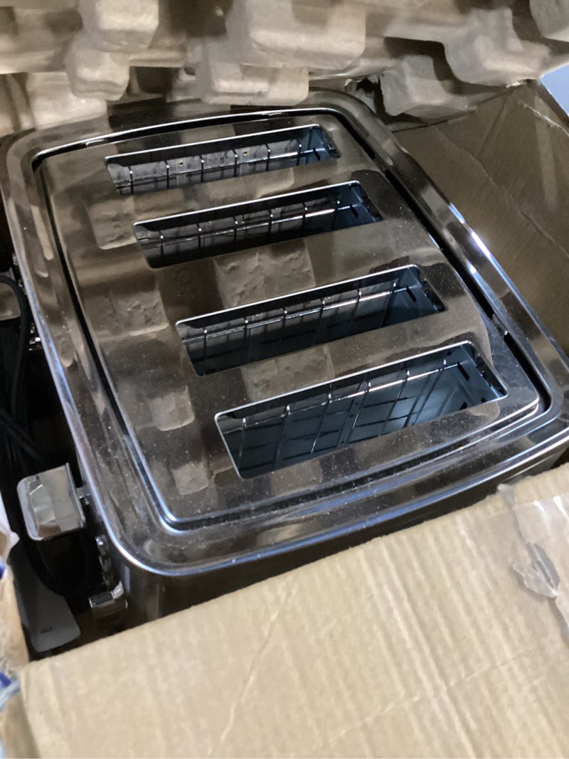 Condition photo showing As Is for GE Stainless Steel 4 Slice Toaster | Extra Wide Slots for Bagels, Breads, Waffles & More | 7 Shade Options | Countertop Kitchen Essentials | 1500 watt 4-Slice Stainless Steel