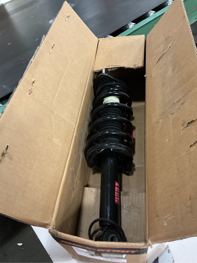Condition photo showing As Is for monroe quick-strut 272957l suspension strut and coil spring assembly for honda cr-v