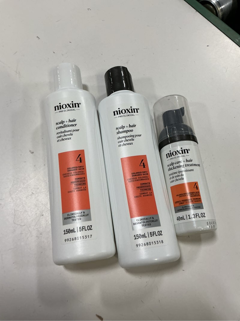 Condition photo showing New/Like New for nioxin system kits | scalp + hair thickening | 1 month supply | natural, colored & damaged hair with light to progressed thinning | strengthen & boost hair density with niacinamide & biotin 1 month supply | trial size system 4 | colored hair, progressed thinning