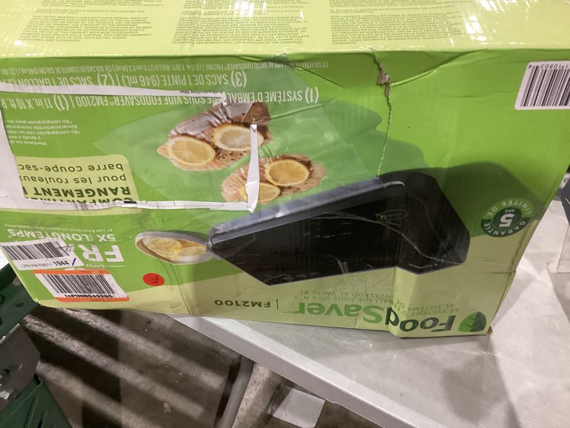 Condition photo showing As Is for FoodSaver Vacuum Sealer Machine, Automatic Bag Detection, Sous Vide Friendly, with sealer bags, roll, handheld vacuum sealer, black Vacuum Sealer + Accessories