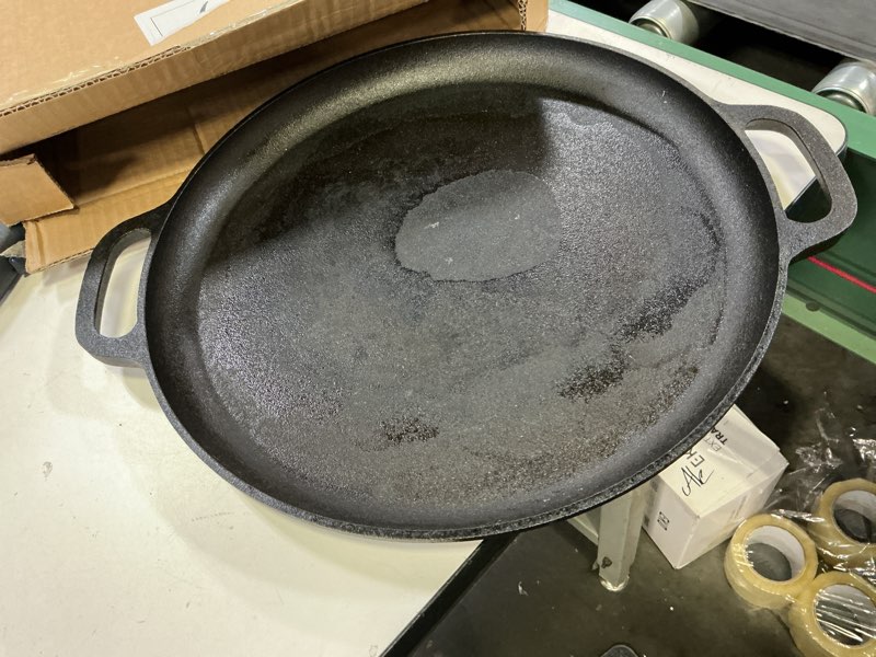 Condition photo showing As Is for Cast Iron Pizza Pan - 14-Inch Baking Pan for Oven, Stovetop, Grill, or Campfires - Durable, Even-Heating, Versatile Cast Iron Griddle by Home-Complete 14" Pizza Pan