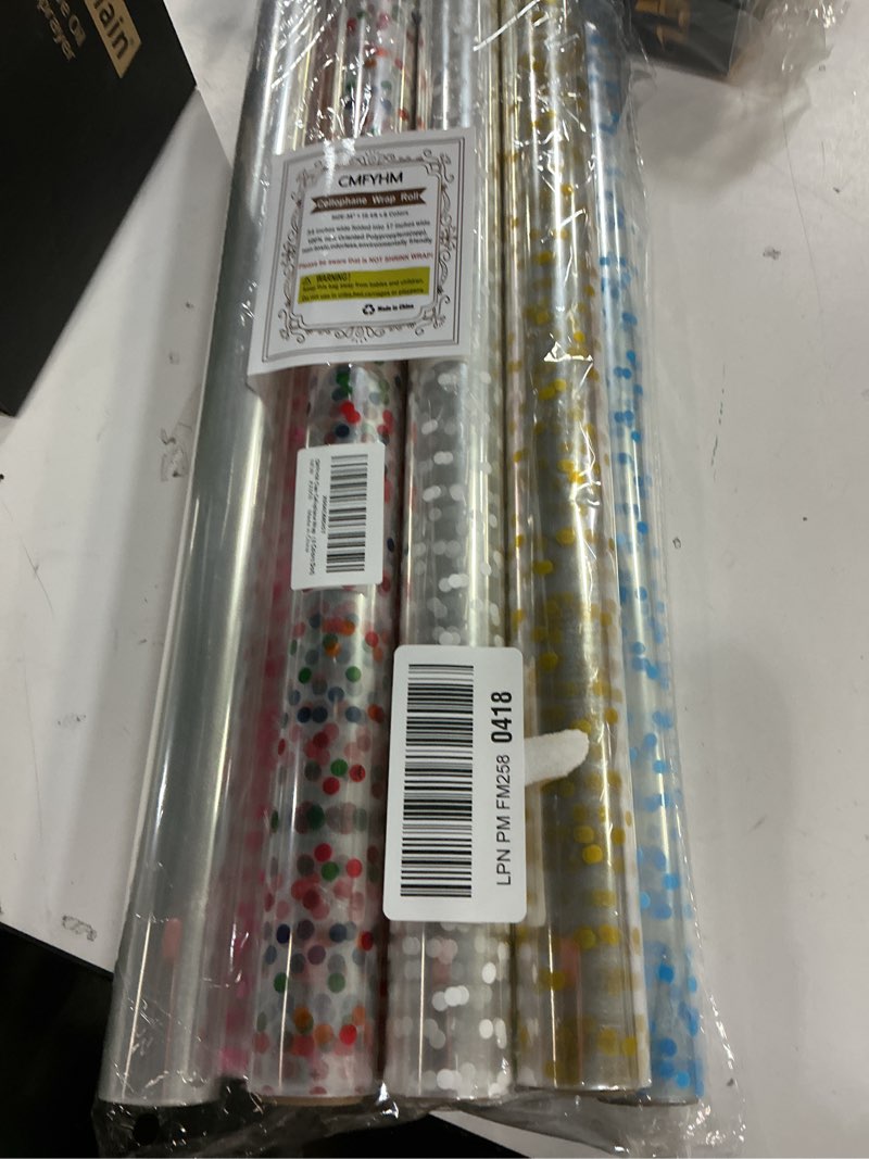 Condition photo showing New/Like New for CMFYHM 8 Rolls clear Cellophane Wrap Roll (34 in x 16.4 ft x 8 Colors) Extra Wide Transparent Polka Dots Cellophane Wrapping for Gift Baskets,Flowers, DIY Craft,Baby Shower, Easter,Christmas 8 rolls of dots