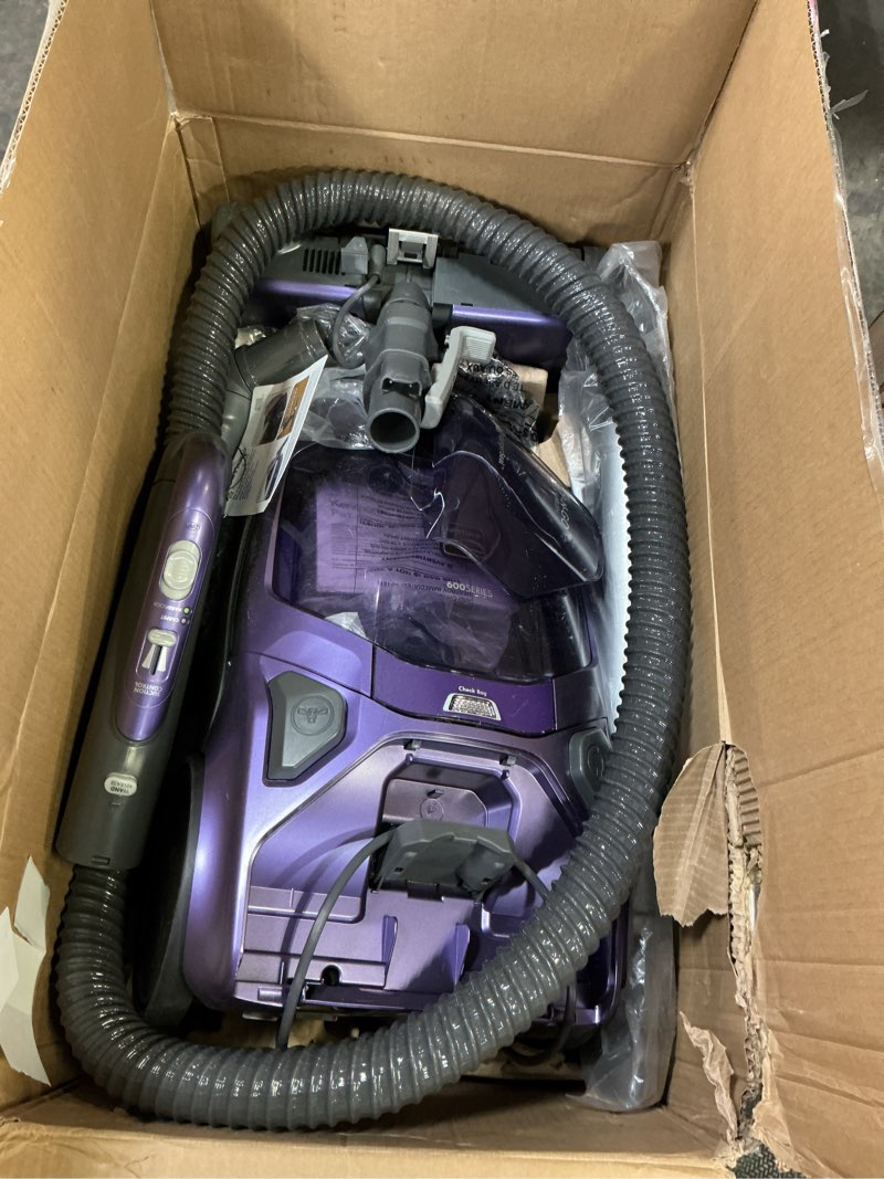 Condition photo showing As Is for Kenmore 600 Series Pet Friendly Lightweight Bagged Canister Vacuum with Pet PowerMate, Pop-N-Go Brush, 2 Motors, HEPA Filter, Aluminum Telescoping Wand, Retractable Cord and 4 Cleaning Tools, Purple