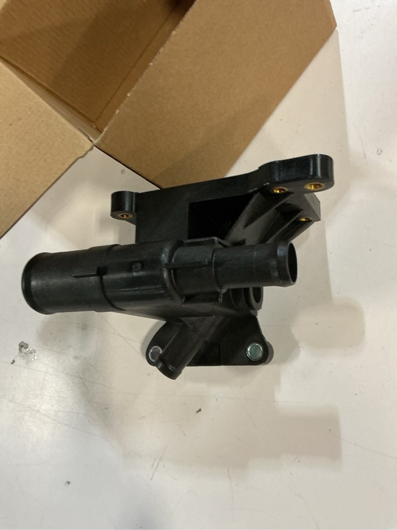 Condition photo showing As Is for Dorman 902-231 Engine Coolant Water Outlet Compatible with Select Ford/Mazda/Mercury Models