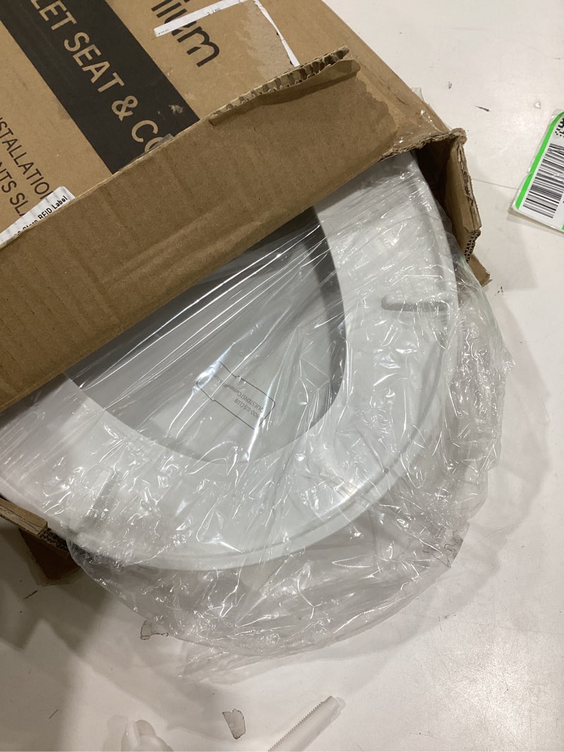 Condition photo showing As Is for Toilet Seat, Round Toilet Seat with Slow Close Hinges, Never Loosen, Easy Installation and Cleaning, For Most Standard Round Toilet Seats(16.5"), Two Sets of Parts, Durable Plastic