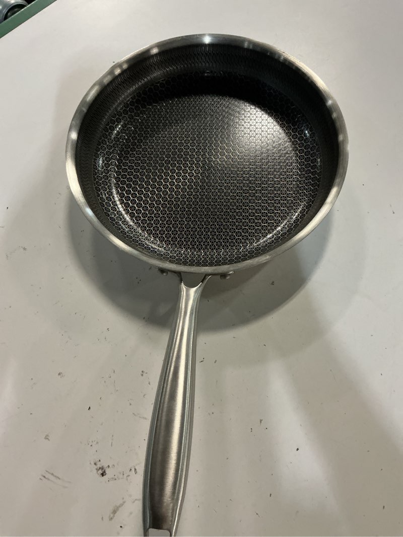 Condition photo showing As Is for oster modessa 8 inch nonstick triply stainless steel frying pan in silver