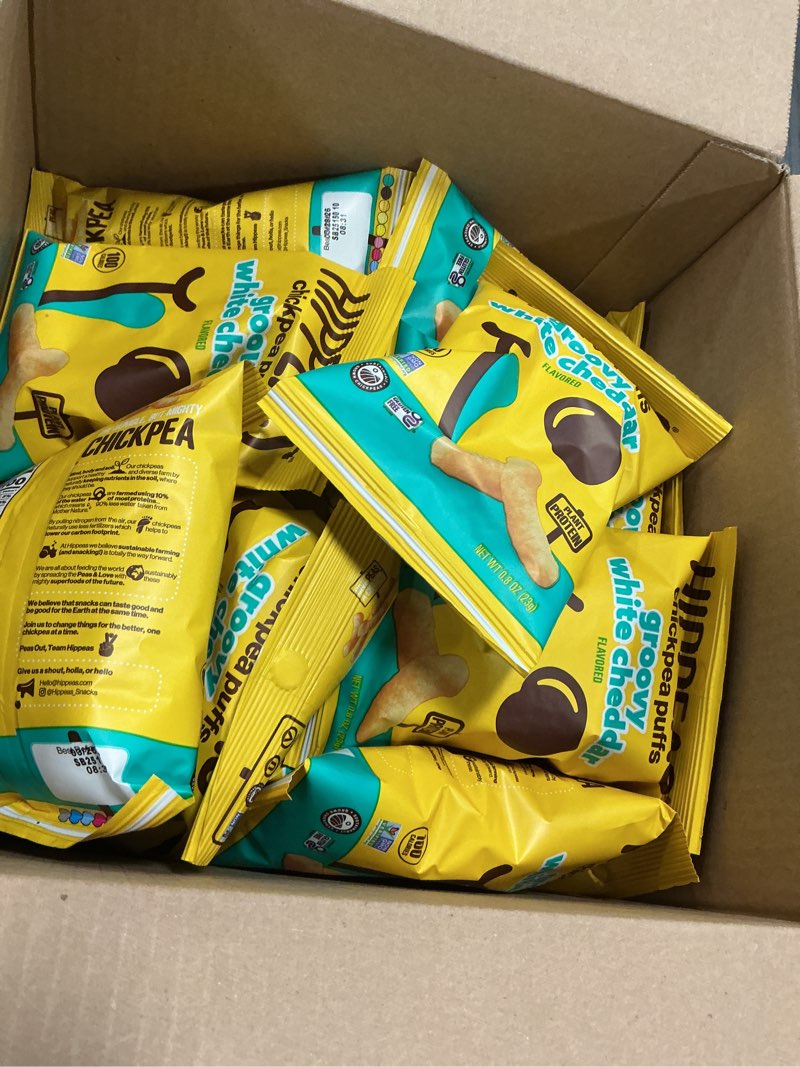 Condition photo showing New/Like New for best before:03/26/2026 HIPPEAS  chickpea puffs  groovy white cheddar