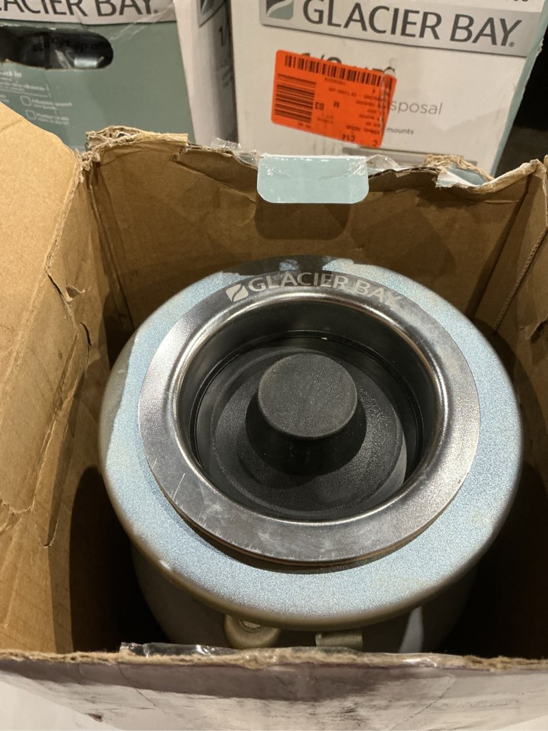 Condition photo showing As Is for turbogrind 1/2 hp. continuous feed garbage disposal with power cord