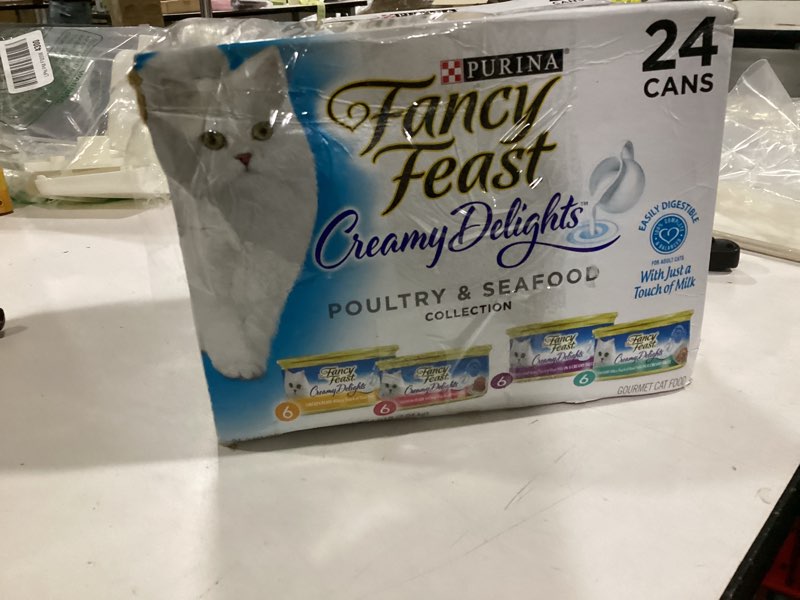 Condition photo showing As Is for **INCOMPLETE** (ONLY16 cans)Purina Fancy Feast Wet Cat Food Variety Pack, Creamy Delights Poultry & Seafood Collection - (Pack of 16) 3 oz. Cans 3 Ounce (Pack of 16)