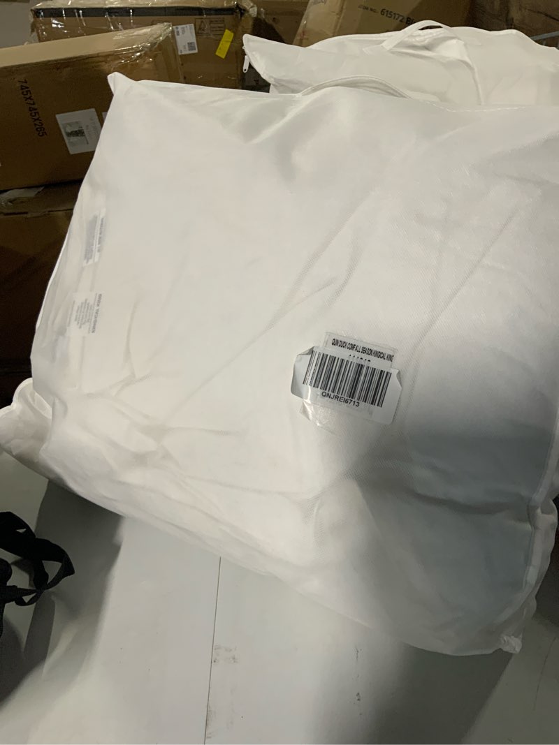 Condition photo showing New/Like New for all-season premium down comforter, full/queen, down