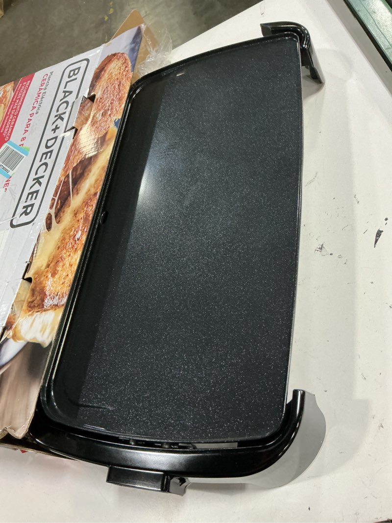 Condition photo showing As Is for black+decker 8-serving electric griddle, gd2051b, non-stick cooking surface, warming tray, removable drip tray, family sized griddle with warming tray