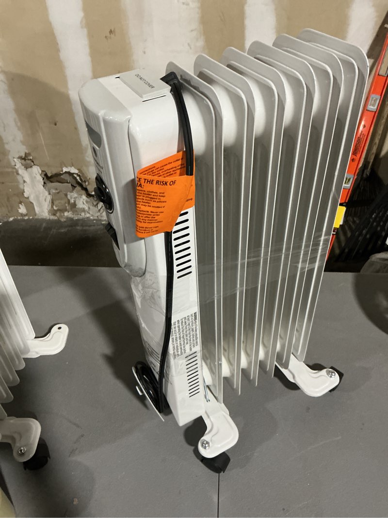 Condition photo showing As Is for visionair oil-filled radiant electric heater 1500 -watt oil-filled radiant tower indoor