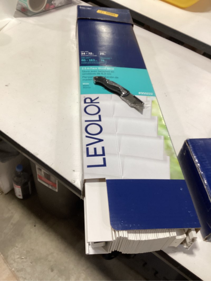 Condition photo showing New/Like New for levolor trim+go 2.5-in slat width 34-in x 72-in cordless white faux wood room darkening horizontal blinds