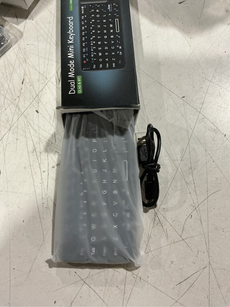 Condition photo showing Good Condition for mini keyboard with touchpad, mini bluetooth keyboard, 2.4g ultra-thin handheld wireless portable, suitable for pc/tablet/tv/smartphone, suitable for travel, office and home use?rechargeable