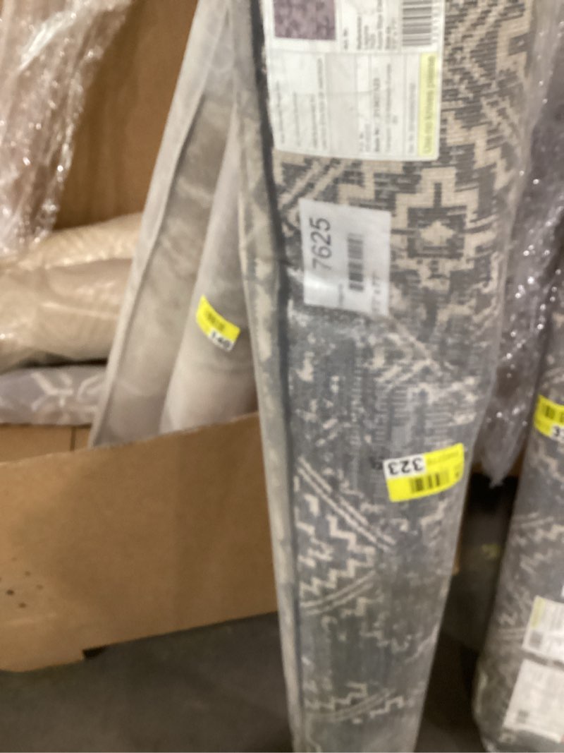 Condition photo showing New/Like New for Aure blue elements 5’3”x7’7” 