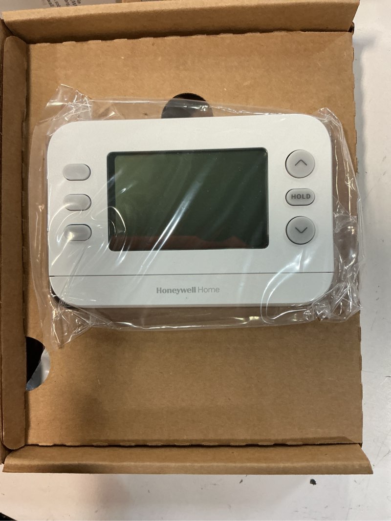 Condition photo showing Good Condition for new! honeywell home programmable thermostat, single-stage, 1 heat/1 cool compatibility, 5-2 day schedule, x2p, white, rth20b