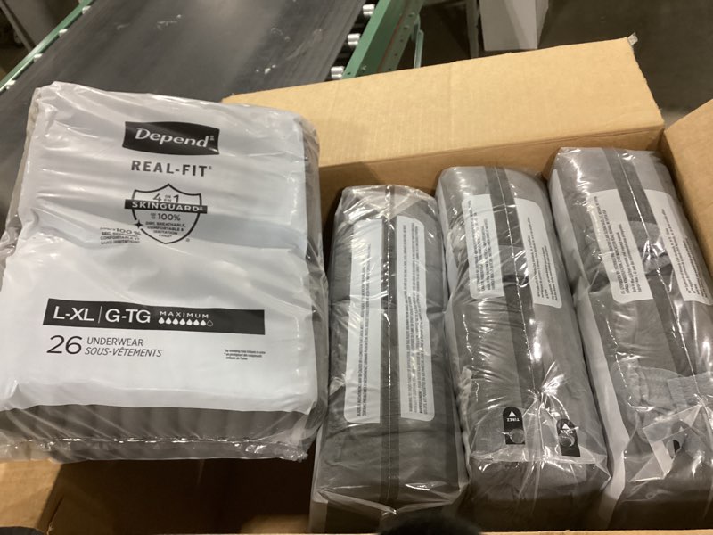 Condition photo showing New/Like New for Depend Real Fit Adult Diapers, Incontinence Underwear for Men, Disposable, Maximum Absorbency, Large/Extra Large, Black, 52 Count (2 packs of 26), Packaging May Vary Black Large/X-Large 52